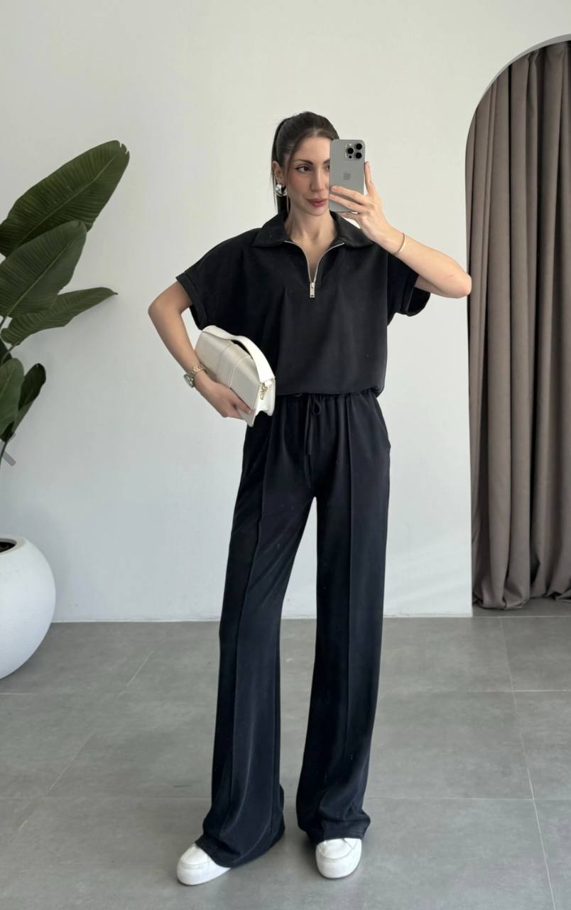 Conjunto negro de punto de dos piezas con top corto de cremallera y pantalón ancho con cordón, bolso de mano blanco y zapatillas – Mayorista Turquía Conjunto negro de punto de dos piezas con top corto de cremallera y pantalón ancho con cordón, bolso de mano blanco y zapatillas - Mayorista Turquía