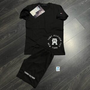 Black short-sleeve crew-neck T-shirt paired with matching drawstring shorts and white chest and leg graphics available for wholesale in Turkey.