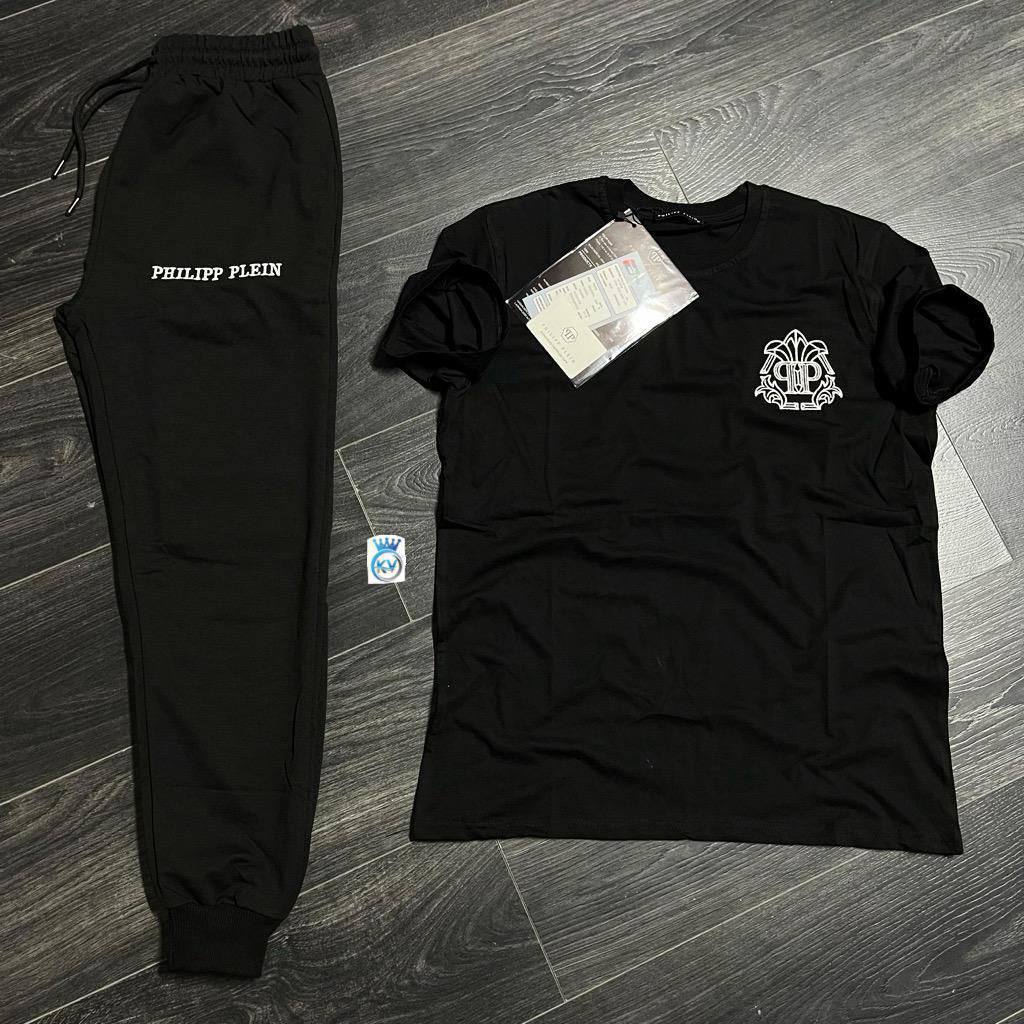 black-tee-jogger-set-1936 Black crew-neck T-shirt with a white chest emblem displayed beside black drawstring joggers.