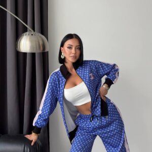 Open blue zip jacket and matching drawstring pants with tiny floral motifs and pale side stripes. available for wholesale in Turkey.