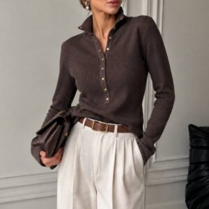 Front view of ribbed brown long-sleeve polo sweater tucked into cream pleated trousers available for wholesale in Turkey.