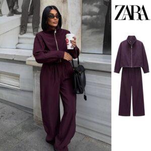 A plum zip-up jacket and wide-leg trousers shown on a model and as a product flat lay. available for wholesale in Turkey.