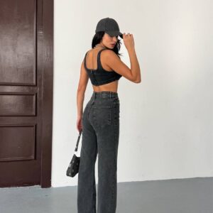 Back view of charcoal wide-leg jeans with two patch pockets, paired with a matching sleeveless crop top.