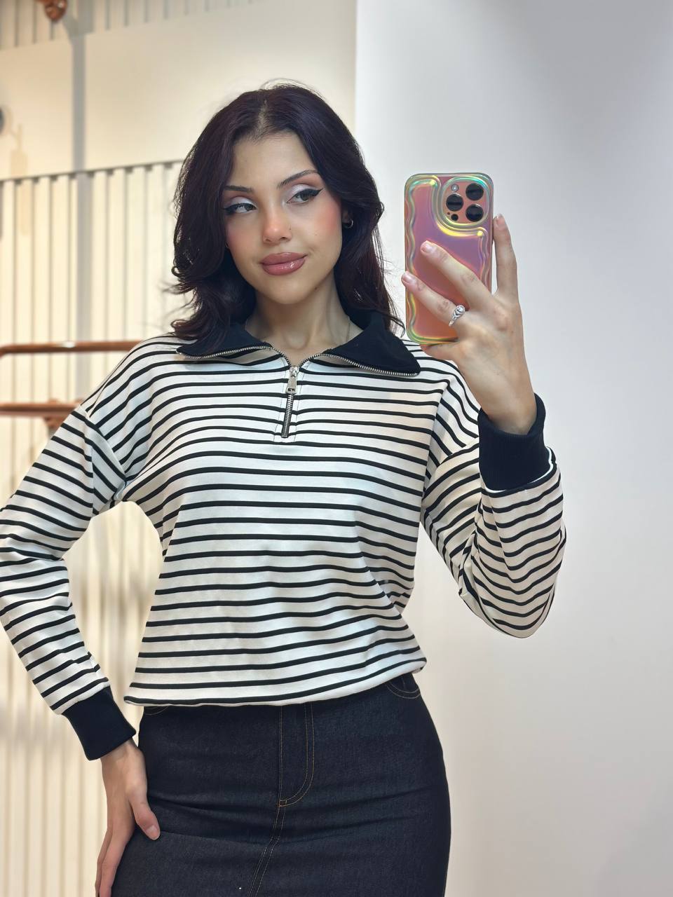 black-stripe-collar-detail-9072 White pullover with narrow black stripes, a black folded collar, front zipper, and matching sleeve cuffs.