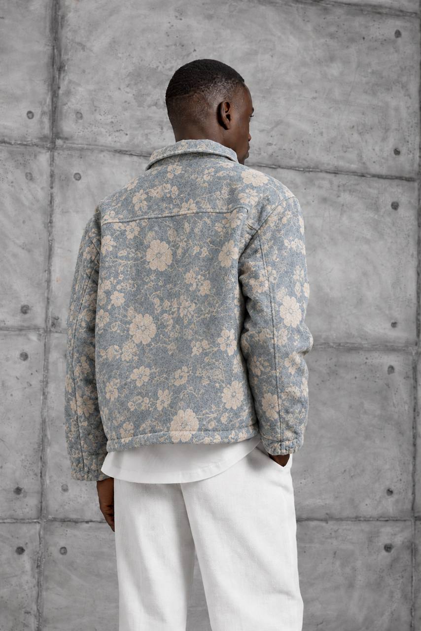 floral-jacket-back-1957 Back view showing the blue jacket's all-over cream floral print, shoulder yoke, and long sleeves.