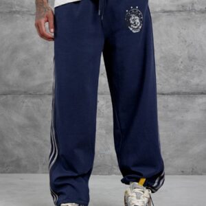 Vorderansicht marineblaue Doppelstrick-Trackhose mit weißem Oberschenkel-Emblem, Kordelzug und schmalen Seitstreifen - Großhandel Türkei