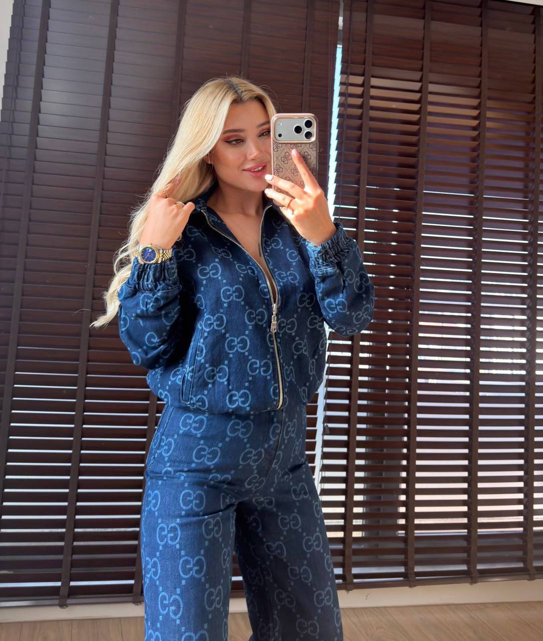 patterned-jacket-trouser-set-4169 A dark blue zip jacket sits above coordinating patterned trousers with a relaxed fit.
