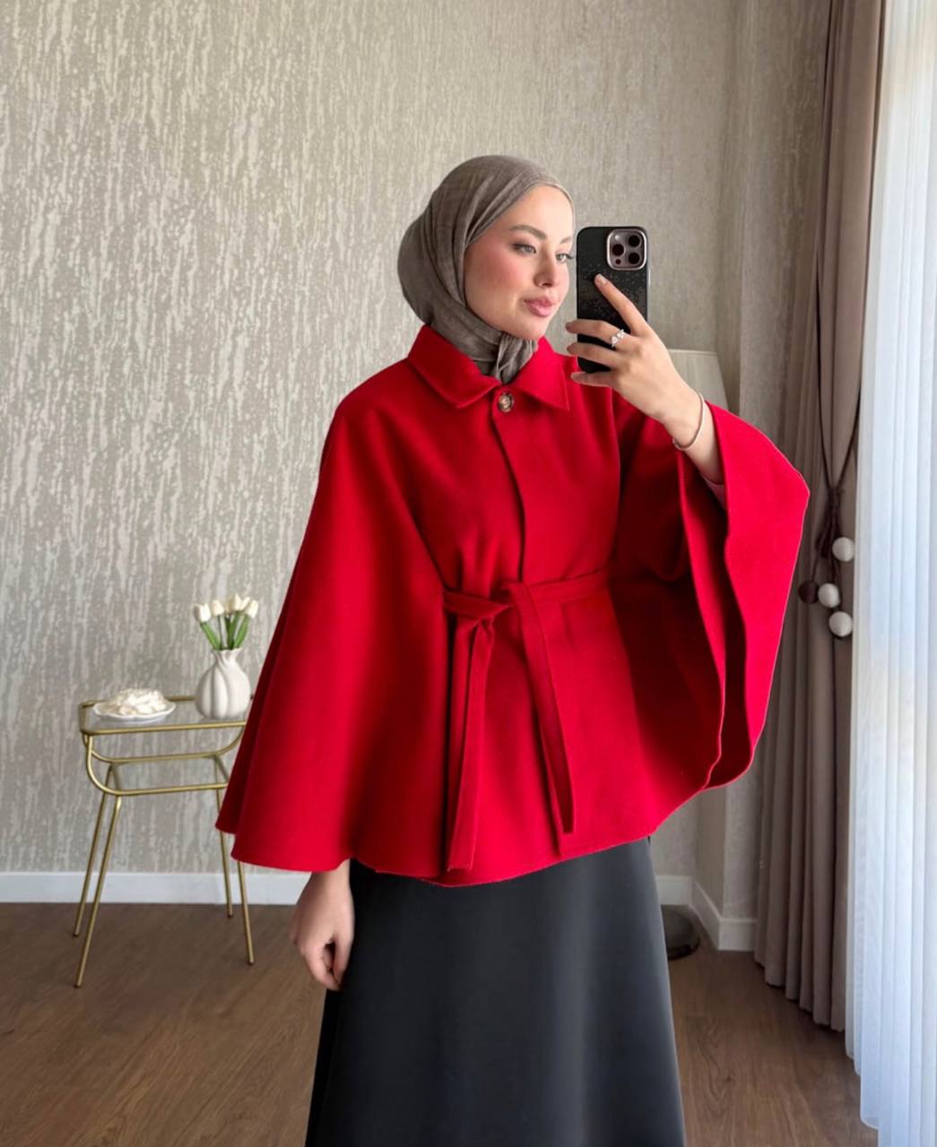 red-belted-cape-coat-8302 Vibrant red cape-style coat with a pointed collar, single button, and matching belt tied at the waist.