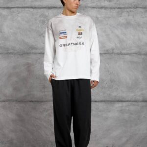 Full front view of a white long-sleeve shirt with a multicolor chest graphic and relaxed fit.